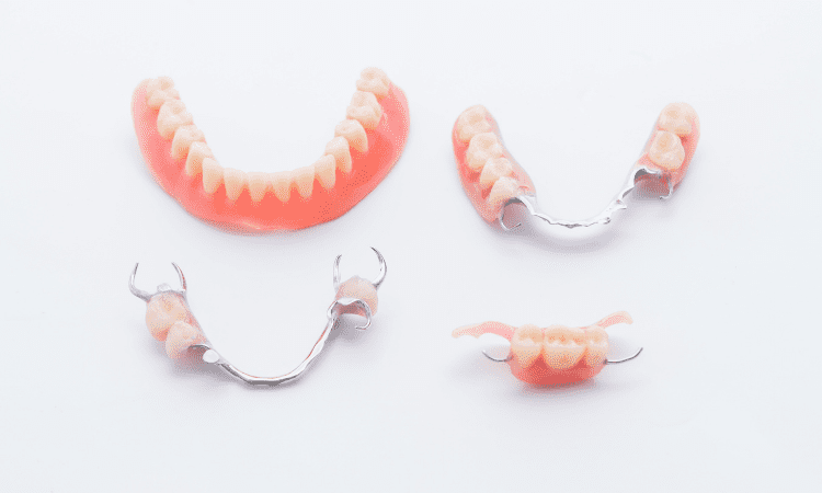 When it comes to replacing missing teeth, patients often face a choice between partial dentures and dental bridges.